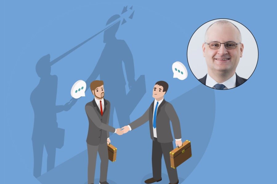 Zwei gezeichnete Männer im Anzug schütteln Hände, daneben ein Porträtfoto.