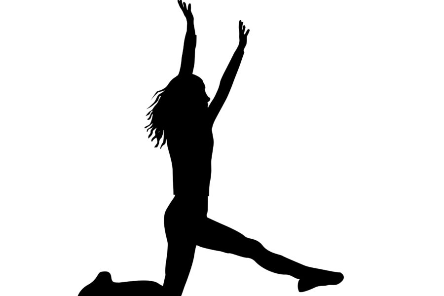 Silhouette einer springenden Person mit erhobenen Armen.