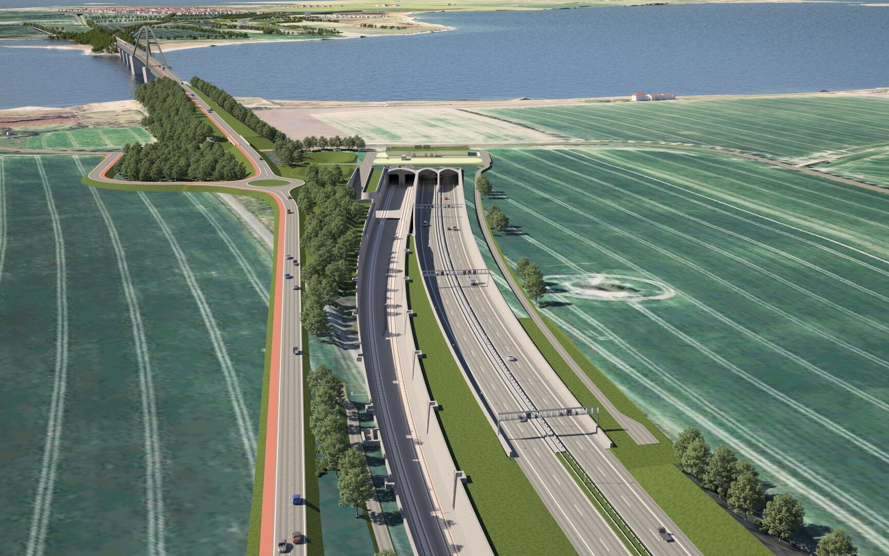 Straße führt durch Tunnel, daneben Brücke über Fluss, umgeben von Feldern und Bäumen.