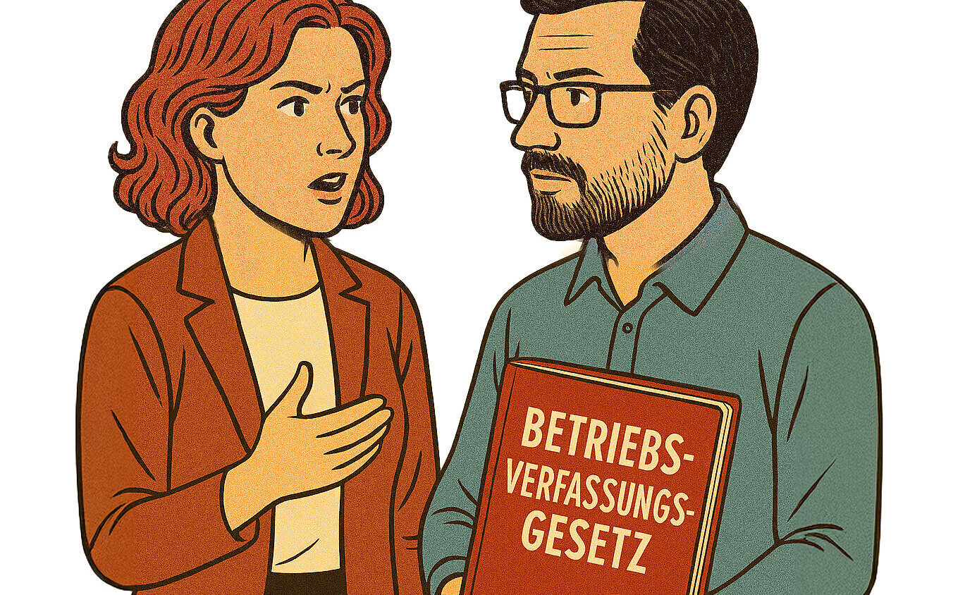 Zwei Personen sprechen; eine hält ein Buch mit "Betriebsverfassungsgesetz".